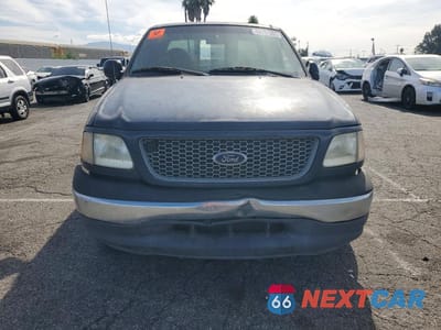 Piąte zdjęcie samochodu w środku: 1999 FORD F-150 VIN:1FTRX17L2XKB33706 - miniatura