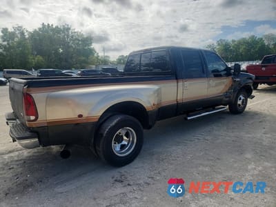 Trzecie zdjęcie samochodu z tyłu: 2000 FORD F350 SUPER DUTY VIN:1FTWW32F3YEA29759 - miniatura