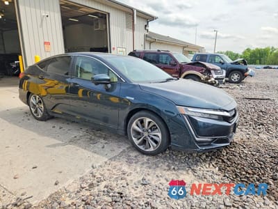 Czwarte zdjęcie samochodu z boku: 2018 HONDA CLARITY TOURING VIN:JHMZC5F37JC010830 - miniatura