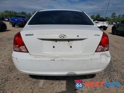 Zdjęcie 6 z 12 samochodu: 2004 HYUNDAI ELANTRA GLS VIN:KMHDN46DX4U827308 - miniatura