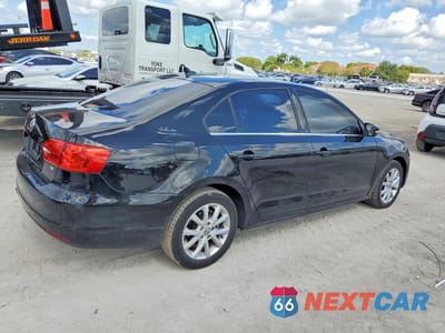 Trzecie zdjęcie samochodu z tyłu: 2014 VOLKSWAGEN JETTA SE VIN:3VWD07AJ3EM430513 - miniatura