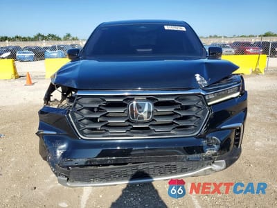 Piąte zdjęcie samochodu w środku: 2024 HONDA PILOT EXL VIN:5FNYG2H40RB003612 - miniatura