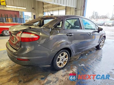 Trzecie zdjęcie samochodu z tyłu: 2016 FORD FIESTA SE VIN:3FADP4BJ7GM103777 - miniatura