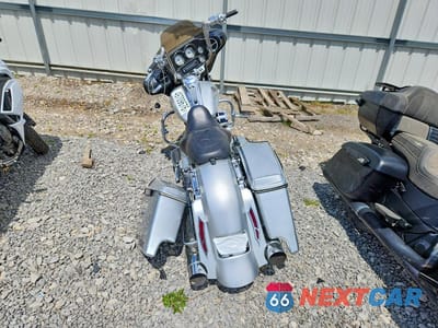 Czwarte zdjęcie samochodu z boku: 2010 HARLEY-DAVIDSON FLHX VIN:1HD1KB417AB601049 - miniatura