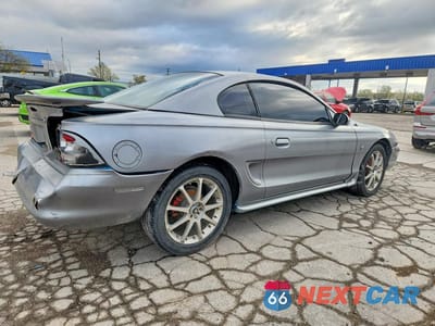Trzecie zdjęcie samochodu z tyłu: 1995 FORD MUSTANG VIN:1FALP4046SF200454 - miniatura