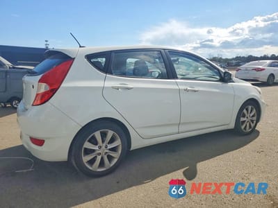 Trzecie zdjęcie samochodu z tyłu: 2012 HYUNDAI ACCENT SE VIN:KMHCU5AE7CU020506 - miniatura