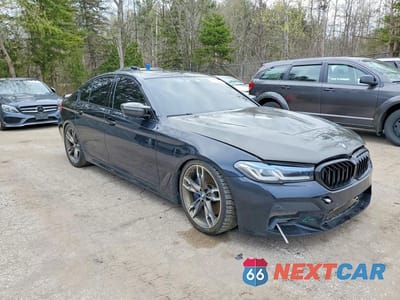 Czwarte zdjęcie samochodu z boku: 2020 BMW M550XI VIN:WBAJS7C00LCE67134 - miniatura