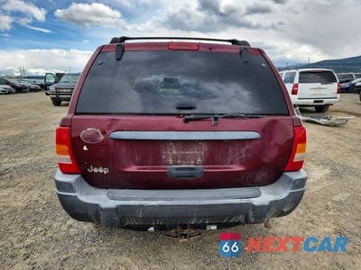 Zdjęcie 6 z 13 samochodu: 2001 JEEP GRAND CHEROKEE LAREDO VIN:1J4GW48S41C509187 - miniatura