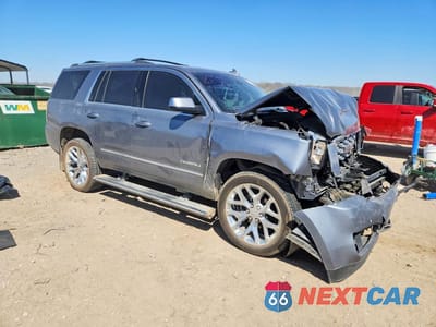 Czwarte zdjęcie samochodu z boku: 2018 GMC YUKON DENALI VIN:1GKS1CKJ8JR312601 - miniatura