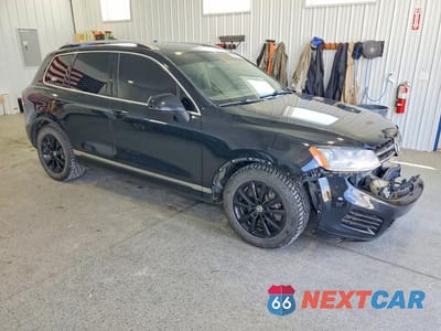 Czwarte zdjęcie samochodu z boku: 2013 VOLKSWAGEN TOUAREG V6 VIN:WVGEF9BP7DD009971 - miniatura