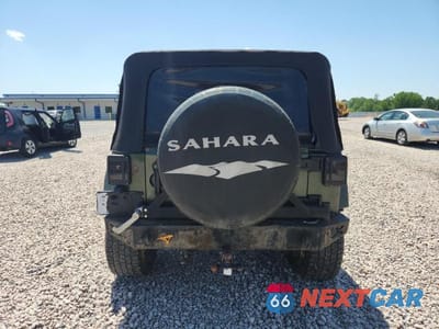 Zdjęcie 6 z 12 samochodu: 2008 JEEP WRANGLER UNLIMITED SAHARA VIN:1J8GA591X8L576346 - miniatura