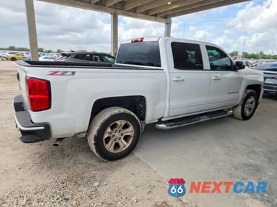 Trzecie zdjęcie samochodu z tyłu: 2017 CHEVROLET SILVERADO K1500 LT VIN:3GCUKREC0HG241177 - miniatura