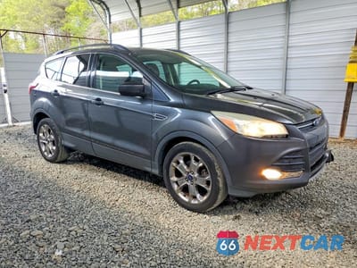 Czwarte zdjęcie samochodu z boku: 2015 FORD ESCAPE SE VIN:1FMCU0GX0FUC20739 - miniatura