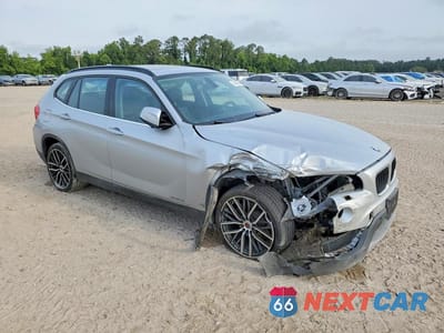 Czwarte zdjęcie samochodu z boku: 2013 BMW X1 XDRIVE28I VIN:WBAVL1C54DVR81773 - miniatura