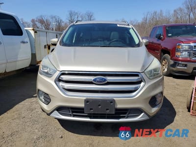 Piąte zdjęcie samochodu w środku: 2017 FORD ESCAPE TITANIUM VIN:1FMCU9JD4HUD99356 - miniatura