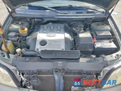 Zdjęcie 12 z 13 samochodu: 2004 KIA SEDONA LX VIN:KNDUP131946582223 - miniatura