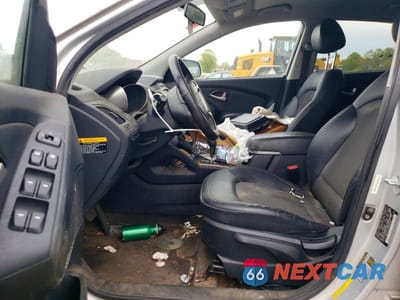 Zdjęcie 7 z 13 samochodu: 2010 HYUNDAI TUCSON GLS VIN:KM8JUCAC8AU046409 - miniatura