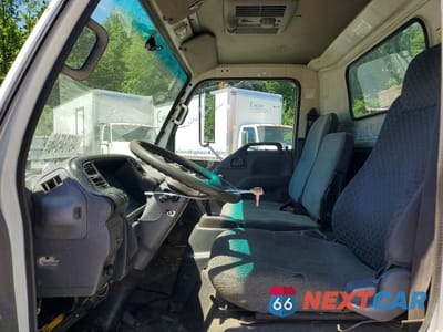Zdjęcie 7 z 12 samochodu: 2000 ISUZU NPR VIN:JALC4B145Y7013651 - miniatura