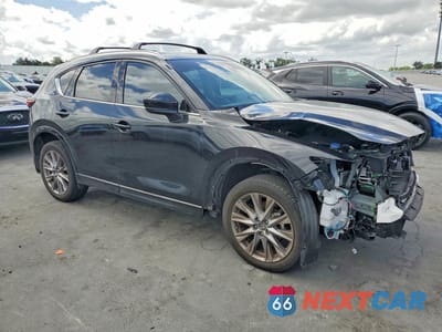 Czwarte zdjęcie samochodu z boku: 2024 MAZDA CX-5 PREMIUM PLUS VIN:JM3KFBEL6R0419027 - miniatura