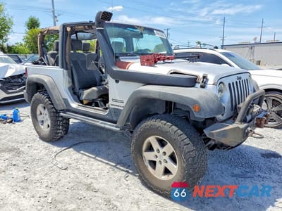 Czwarte zdjęcie samochodu z boku: 2010 JEEP WRANGLER SPORT VIN:1J4AA2D19AL119997 - miniatura