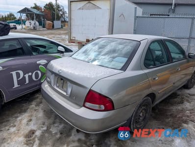 Trzecie zdjęcie samochodu z tyłu: 2002 NISSAN SENTRA XE VIN:3N1CB51D92L592996 - miniatura