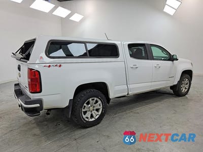 Trzecie zdjęcie samochodu z tyłu: 2017 CHEVROLET COLORADO LT VIN:1GCGTCEN9H1279966 - miniatura