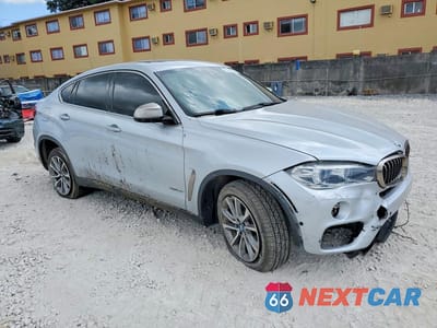 Czwarte zdjęcie samochodu z boku: 2018 BMW X6 SDRIVE35I VIN:5UXKU0C50J0G81297 - miniatura