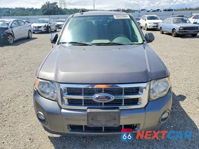 Piąte zdjęcie samochodu w środku: 2010 FORD ESCAPE XLT VIN:1FMCU0D73AKA29955 - miniatura