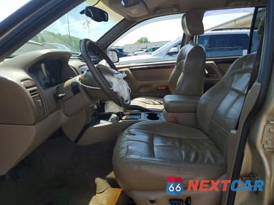 Zdjęcie 7 z 13 samochodu: 2001 JEEP GRAND CHEROKEE VIN:1J4GW58S91C696156 - miniatura