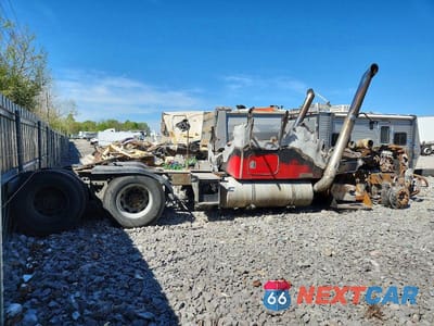 Czwarte zdjęcie samochodu z boku: 2005 KENWORTH CONSTRUCTION T600 VIN:1XKADB9X85J073689 - miniatura