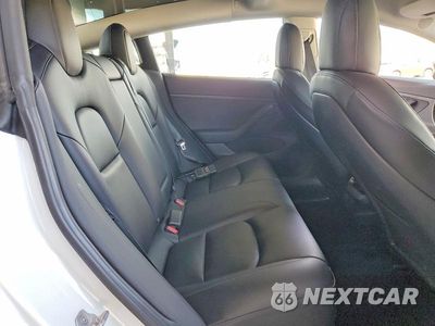 Zdjęcie 10 z 12 samochodu: 2021 TESLA MODEL 3 VIN:5YJ3E1EAXMF874109 - miniatura