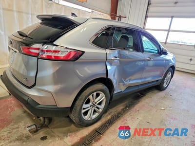 Trzecie zdjęcie samochodu z tyłu: 2020 FORD EDGE SEL VIN:2FMPK4J92LBB57802 - miniatura