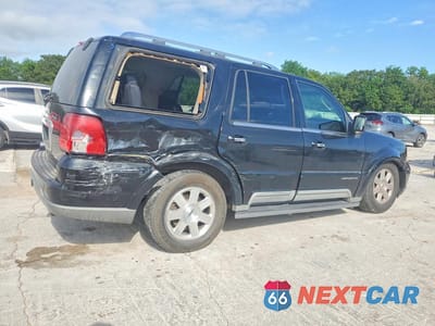 Trzecie zdjęcie samochodu z tyłu: 2003 LINCOLN NAVIGATOR VIN:5LMFU27R13LJ11988 - miniatura