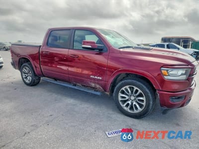 Czwarte zdjęcie samochodu z boku: 2019 RAM 1500 LARAMIE VIN:1C6RREJT0KN720933 - miniatura