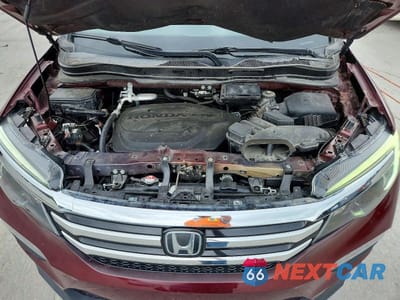 Zdjęcie 12 z 13 samochodu: 2018 HONDA PILOT TOURING VIN:5FNYF6H94JB017376 - miniatura