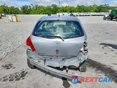 Zdjęcie 6 z 13 samochodu: 2011 TOYOTA YARIS BASE VIN:JTDJT4K39B5339470 - miniatura