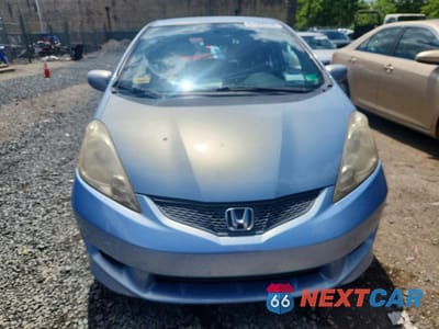 Piąte zdjęcie samochodu w środku: 2009 HONDA FIT SPORT VIN:JHMGE88479S041733 - miniatura
