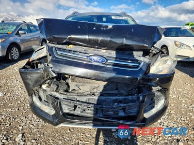 Piąte zdjęcie samochodu w środku: 2015 FORD ESCAPE TITANIUM VIN:1FMCU9J98FUA27222 - miniatura