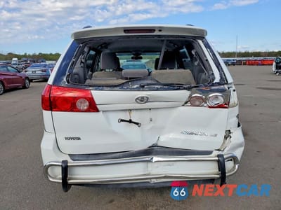 Zdjęcie 6 z 12 samochodu: 2010 TOYOTA SIENNA LE 7-PASSENGER VIN:5TDKK4CC0AS327108 - miniatura