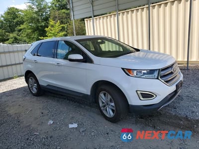 Czwarte zdjęcie samochodu z boku: 2018 FORD EDGE SEL VIN:2FMPK3J95JBC12931 - miniatura