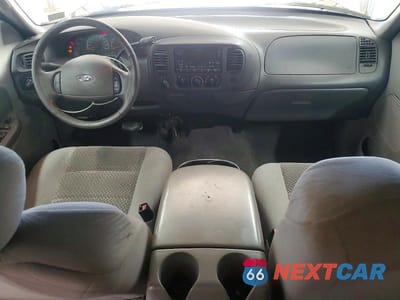 Zdjęcie 8 z 12 samochodu: 2003 FORD F150 SUPERCREW VIN:1FTRW08L13KB16031 - miniatura