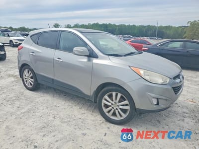 Czwarte zdjęcie samochodu z boku: 2013 HYUNDAI TUCSON LIMITED VIN:KM8JU3AC6DU564331 - miniatura