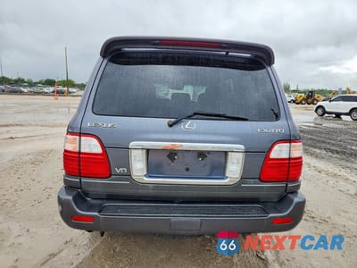 Zdjęcie 6 z 13 samochodu: 2004 LEXUS LX 470 VIN:JTJHT00W943547090 - miniatura