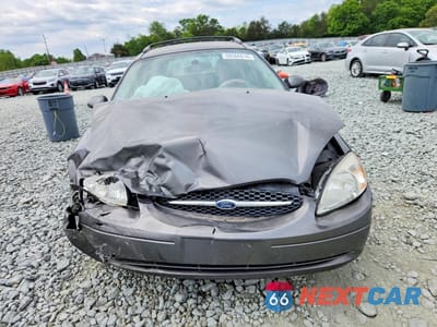Piąte zdjęcie samochodu w środku: 2003 FORD TAURUS SEL VIN:1FAFP59S83A234799 - miniatura