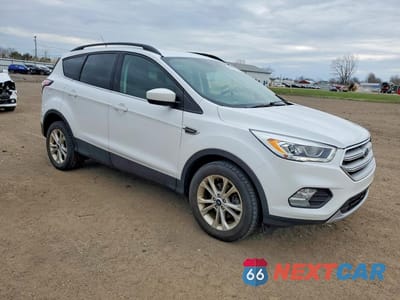 Czwarte zdjęcie samochodu z boku: 2018 FORD ESCAPE SEL VIN:1FMCU0HD0JUC79254 - miniatura
