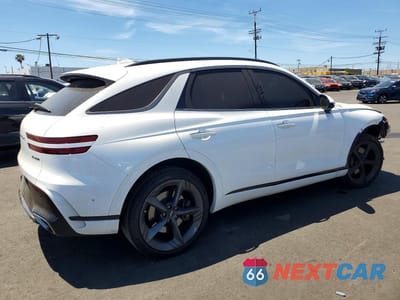 Trzecie zdjęcie samochodu z tyłu: 2026 GENESIS GV70 SPORT PRESTIGE VIN:KMUMEDTC6TU229678 - miniatura