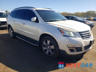 Czwarte zdjęcie samochodu z boku: 2014 CHEVROLET TRAVERSE LTZ VIN:1GNKVJKD1EJ191274 - miniatura