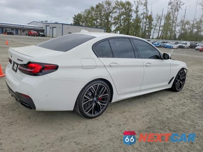 Trzecie zdjęcie samochodu z tyłu: 2022 BMW M550XI VIN:WBA13BK04NCJ66237 - miniatura