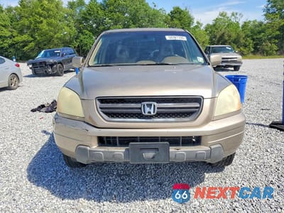 Piąte zdjęcie samochodu w środku: 2004 HONDA PILOT VIN:2HKYF18674H512086 - miniatura