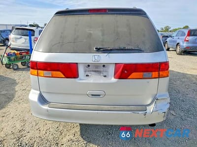 Zdjęcie 6 z 13 samochodu: 2003 HONDA ODYSSEY EX VIN:5FNRL18613B136253 - miniatura